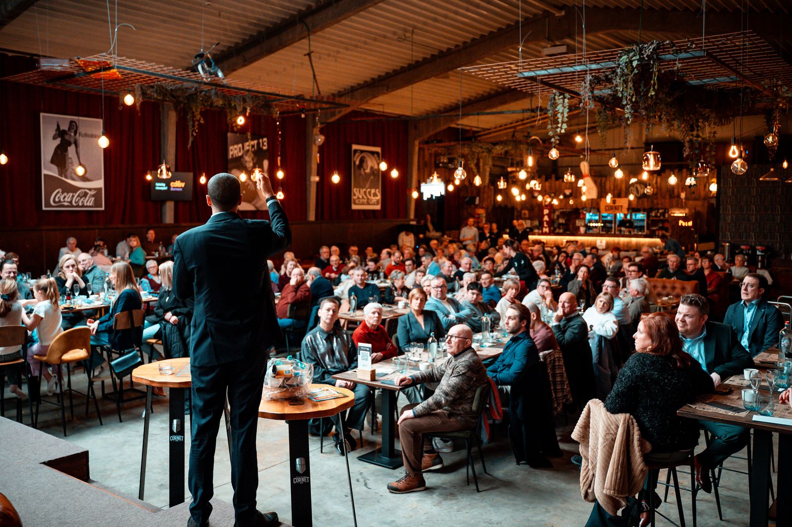 A speaker engaging an audience at an advocacy forum